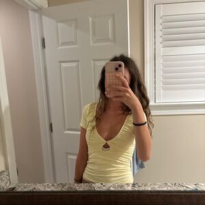 Edikted Soft Yellow Ruched Short Sleeve Tee size xs
Never worn